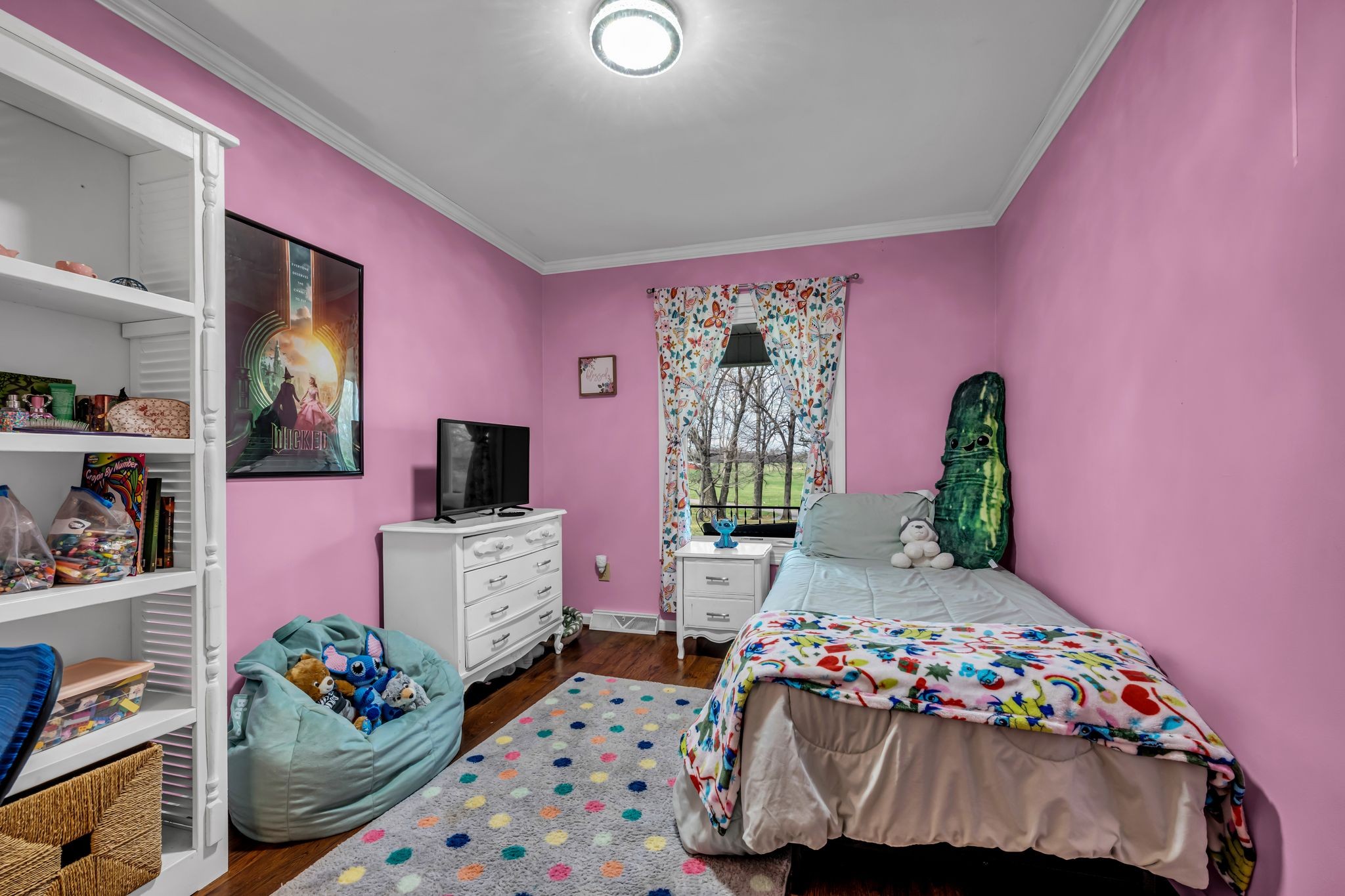 2280 C C C Road Dickson, TN 37055 - Photo 15 of 35 a bedroom with a bed and a couch