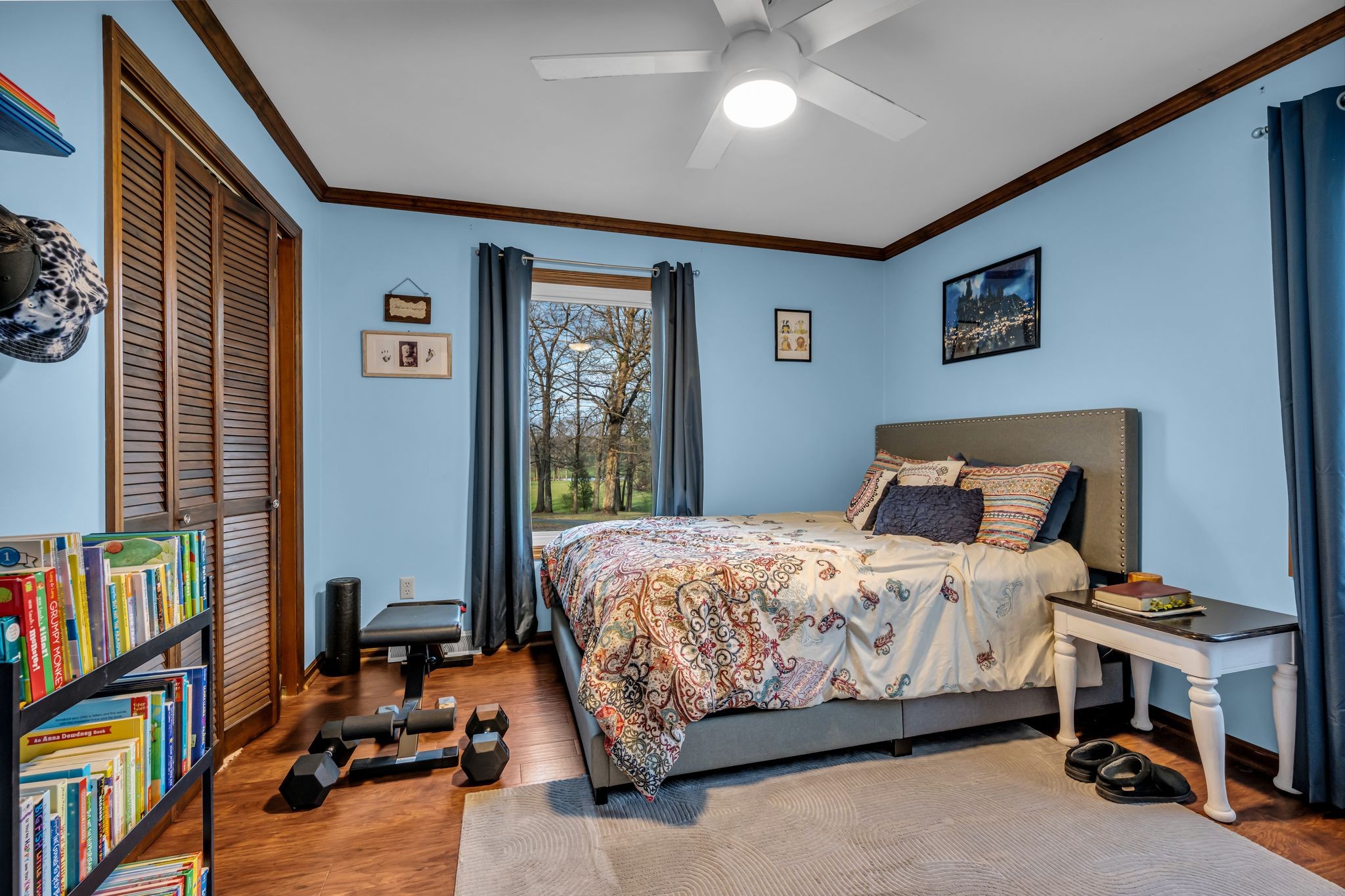 2280 C C C Road Dickson, TN 37055 - Photo 18 of 35 a bedroom with a bed furniture and a book shelf