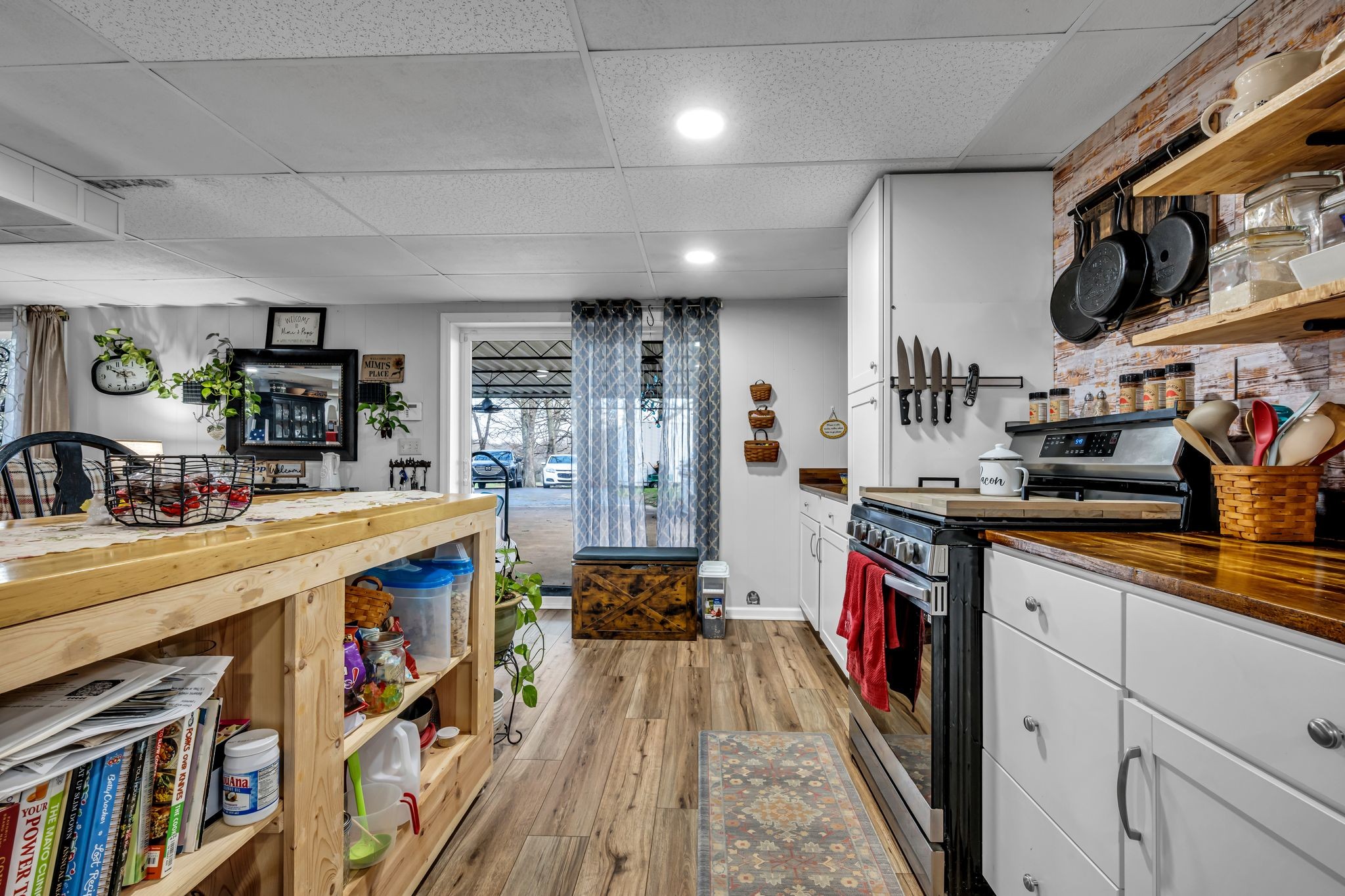 2280 C C C Road Dickson, TN 37055 - Photo 26 of 35 a very nice looking open kitchen with stainless steel appliances granite countertop a lot of cabinets