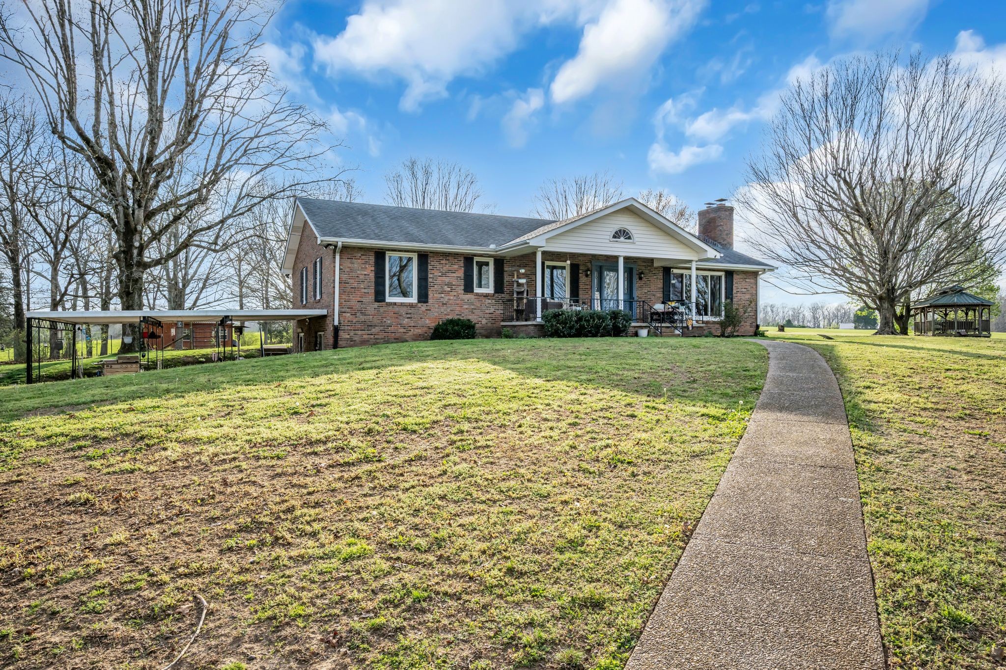 2280 C C C Road Dickson, TN 37055 - Photo 3 of 35 a front view of a house with a yard