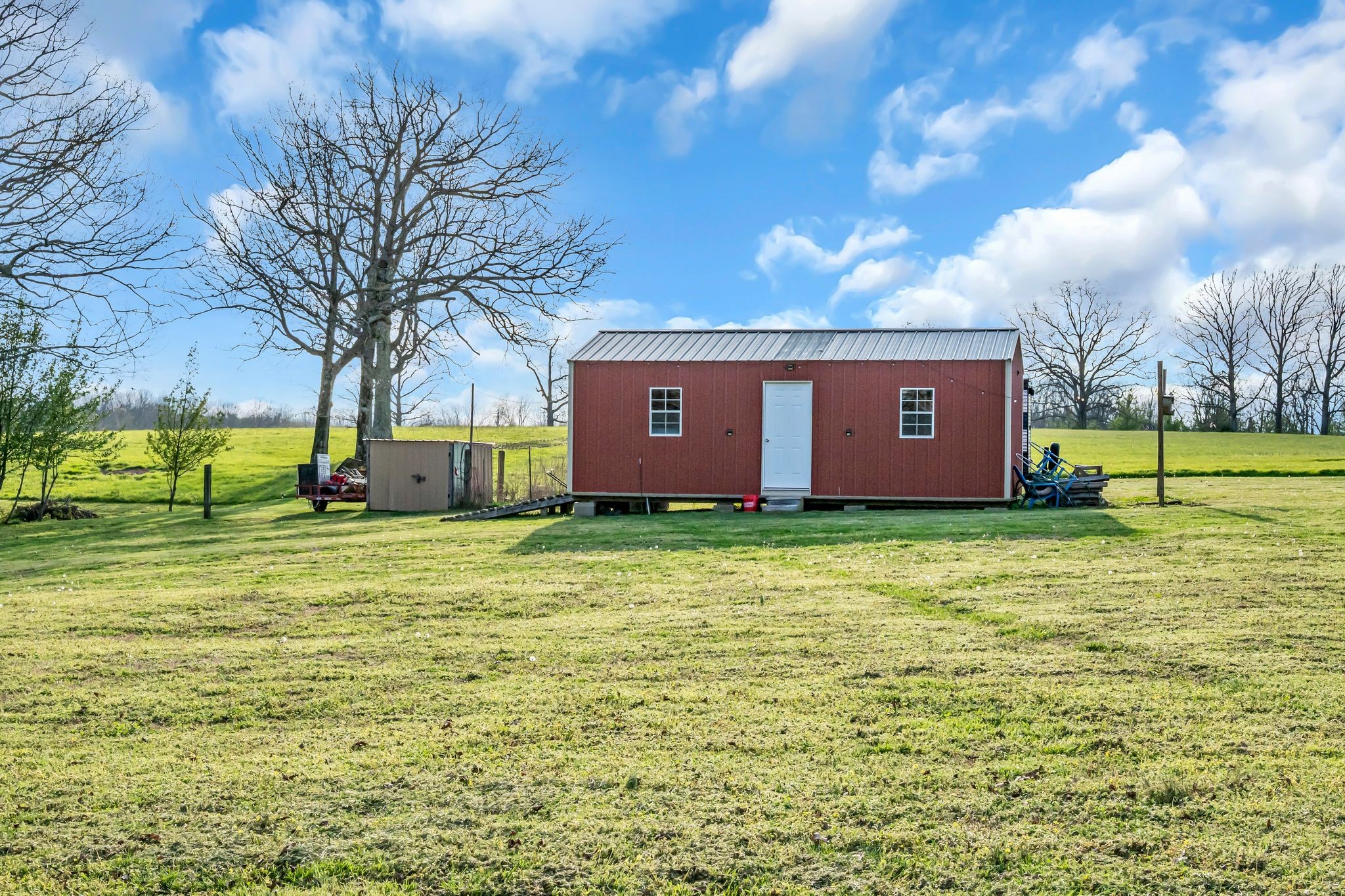 2280 C C C Road Dickson, TN 37055 - Photo 34 of 35 a view of a house with a yard
