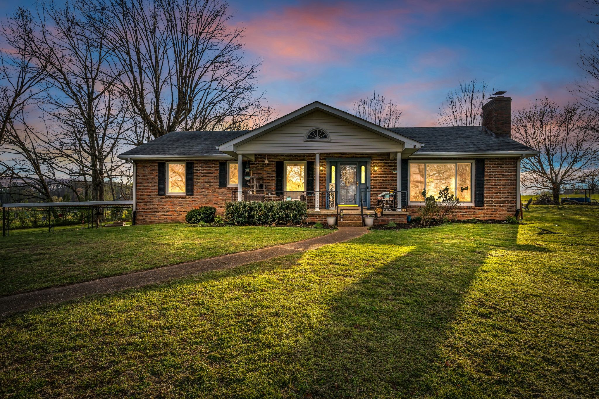 2280 C C C Road Dickson, TN 37055 - Photo 35 of 35 a front view of a house with swimming pool and porch