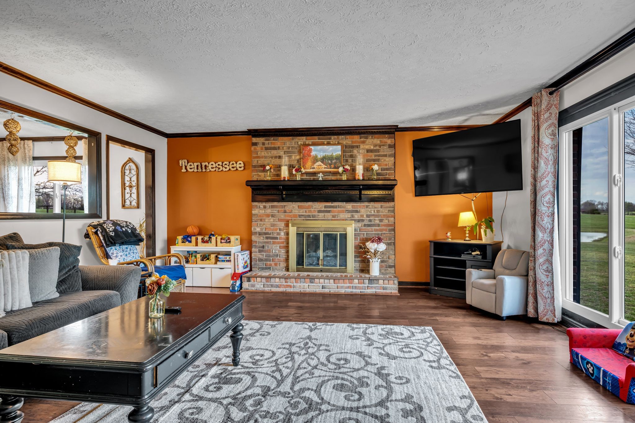 2280 C C C Road Dickson, TN 37055 - Photo 5 of 35 a living room with furniture and a fireplace