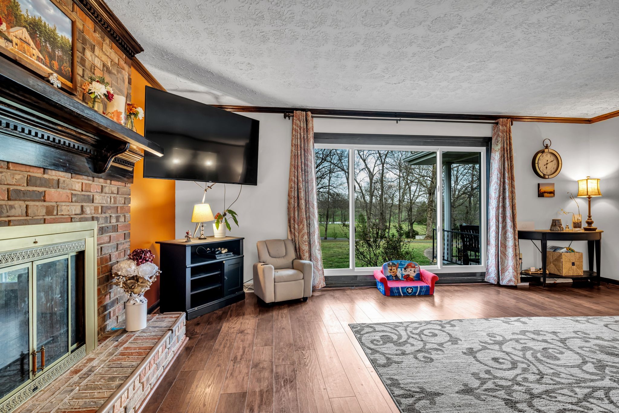 2280 C C C Road Dickson, TN 37055 - Photo 7 of 35 a living room with furniture and a fireplace