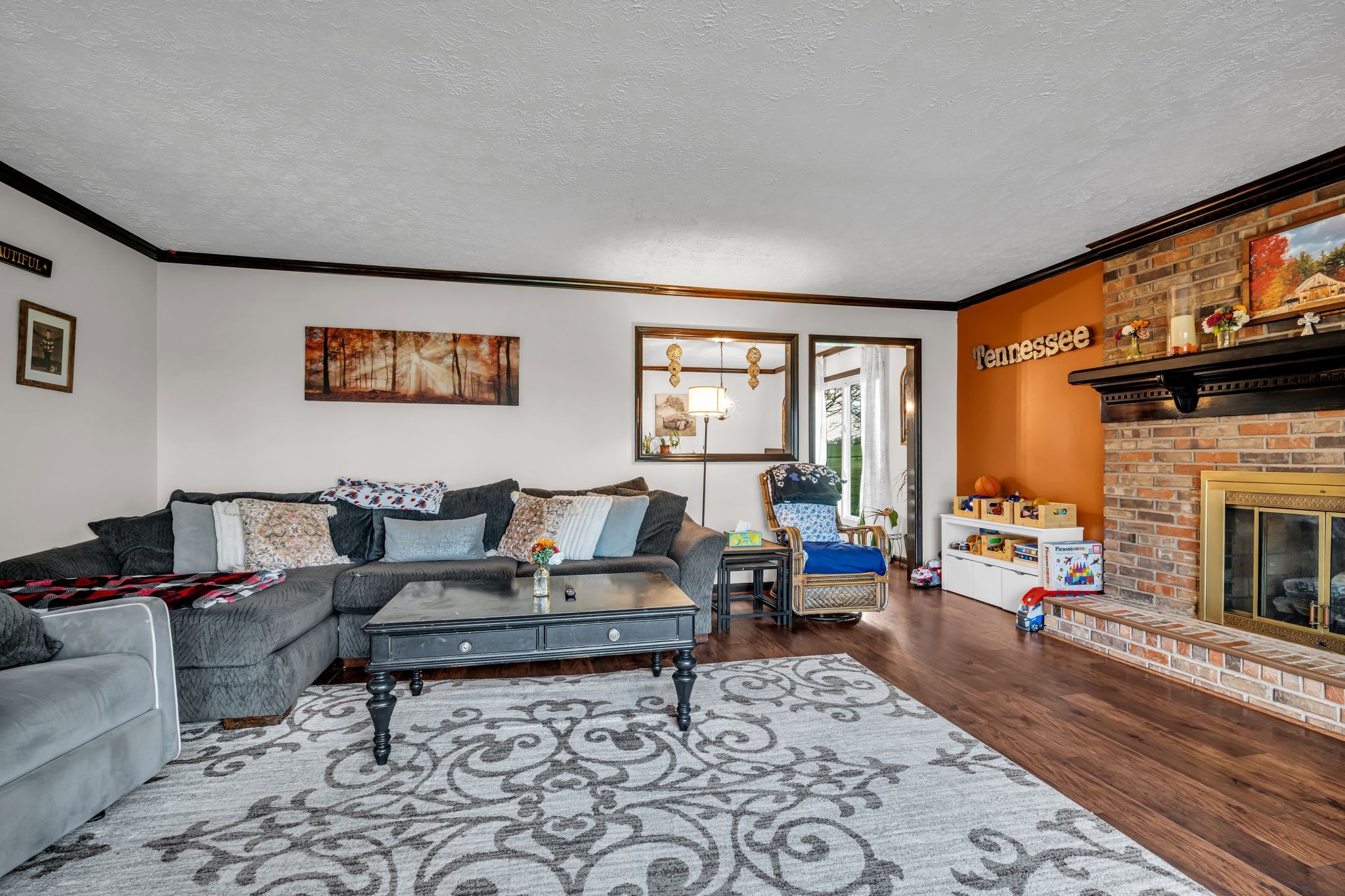 2280 C C C Road Dickson, TN 37055 - Photo 8 of 35 a living room with furniture large window and a fireplace