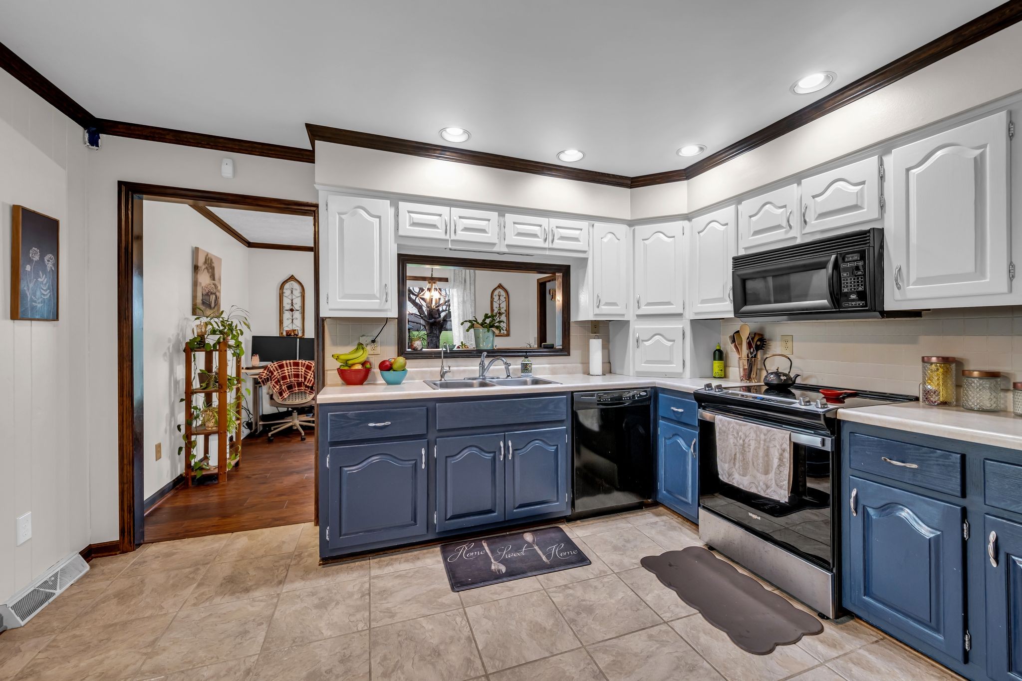 2280 C C C Road Dickson, TN 37055 - Photo 10 of 35 a kitchen with stainless steel appliances granite countertop a stove and cabinets