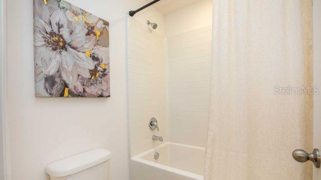 3604 Summitview Drive Lakeland, FL 33803 - Photo 15 of 23 a bathroom with a bathtub and shower
