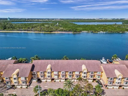 a view of a lake with a city