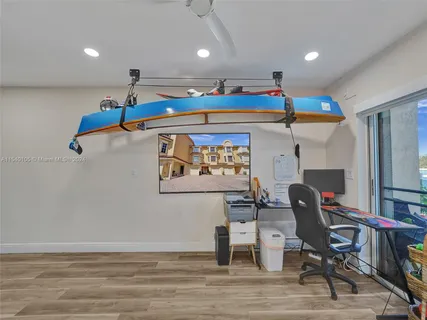 a view of a living room and a wooden floor