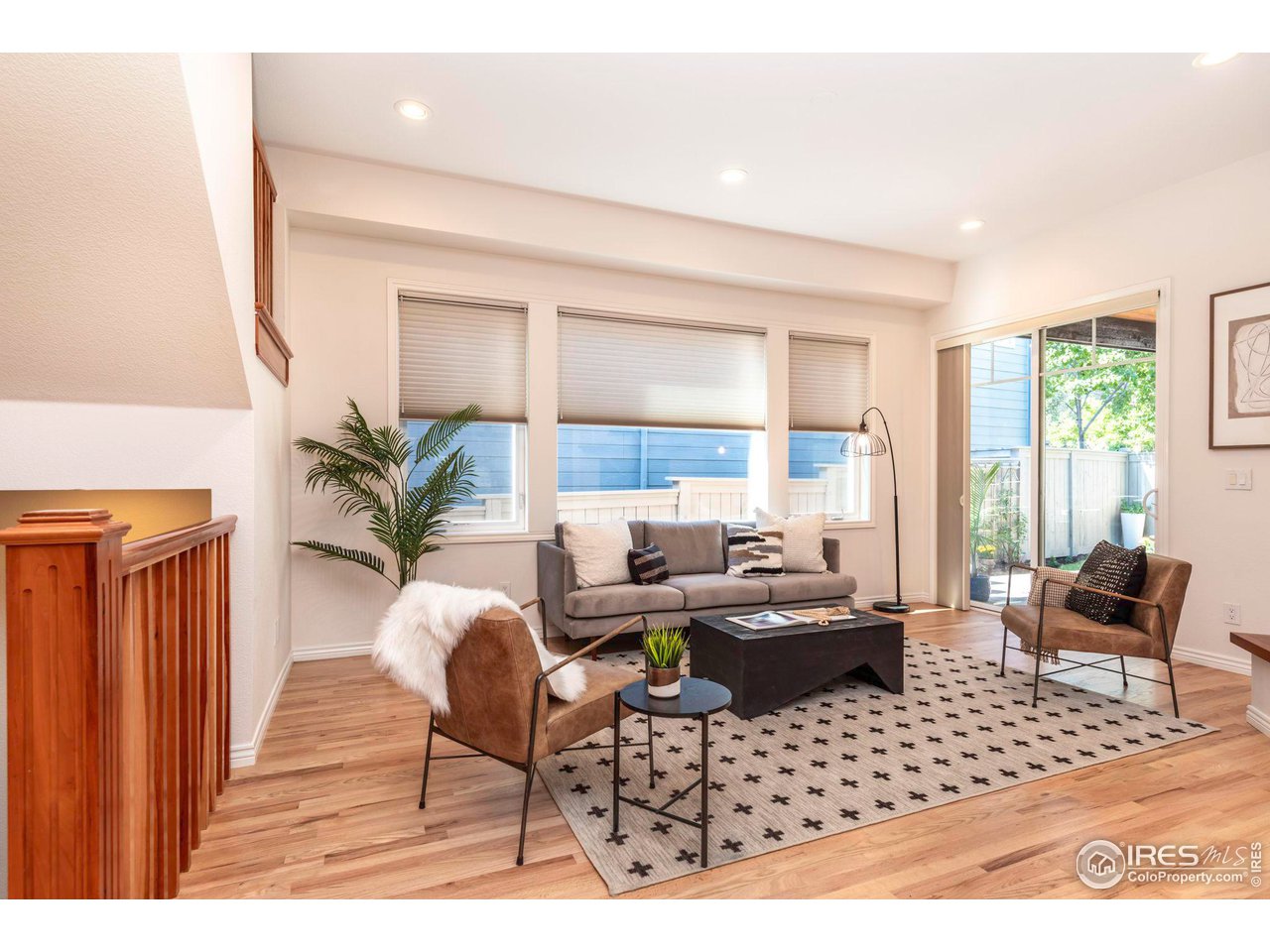 5065 3rd Street Boulder, CO 80304 - Photo 11 of 40 a living room with furniture a large window and dining table