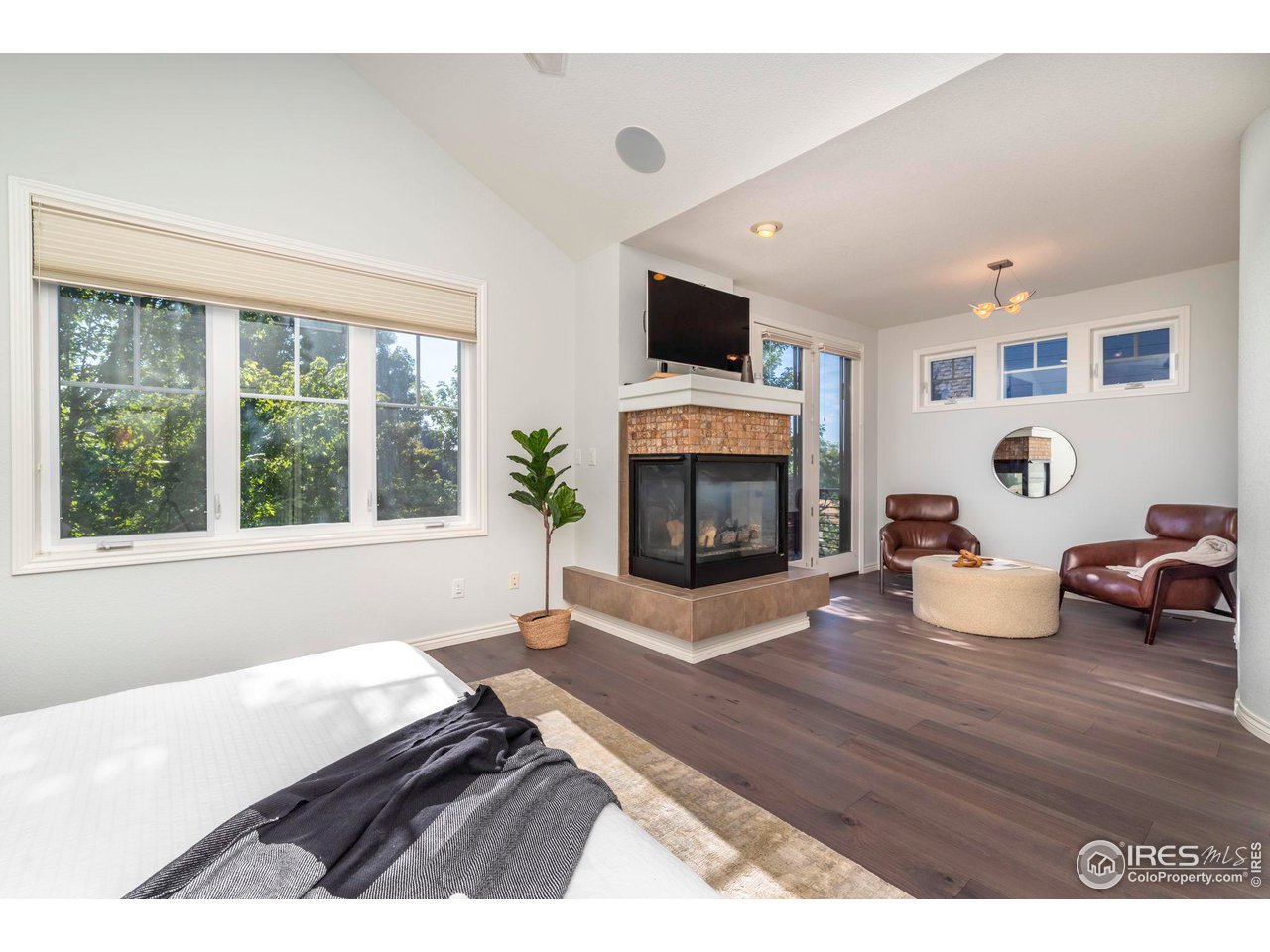 5065 3rd Street Boulder, CO 80304 - Photo 12 of 40 a living room with furniture and a fireplace