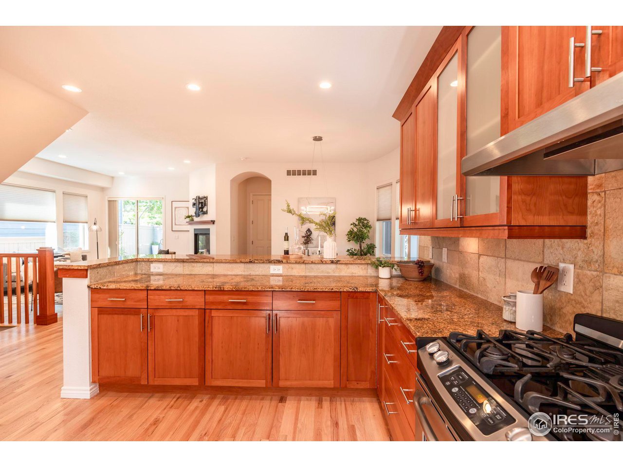 5065 3rd Street Boulder, CO 80304 - Photo 20 of 40 a kitchen with stainless steel appliances granite countertop a stove a sink and a refrigerator