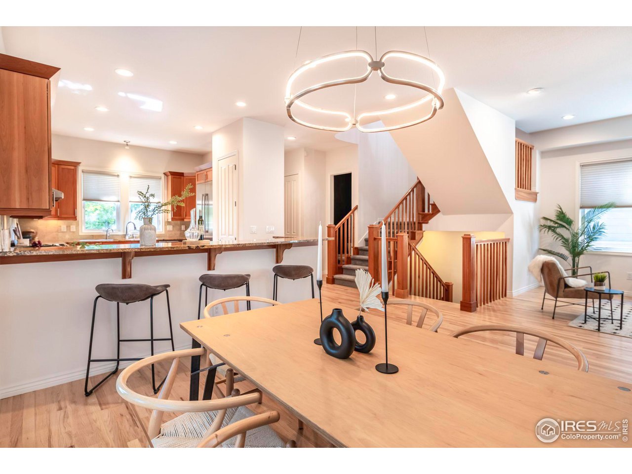 5065 3rd Street Boulder, CO 80304 - Photo 2 of 40 a view of kitchen and dining room with wooden floor