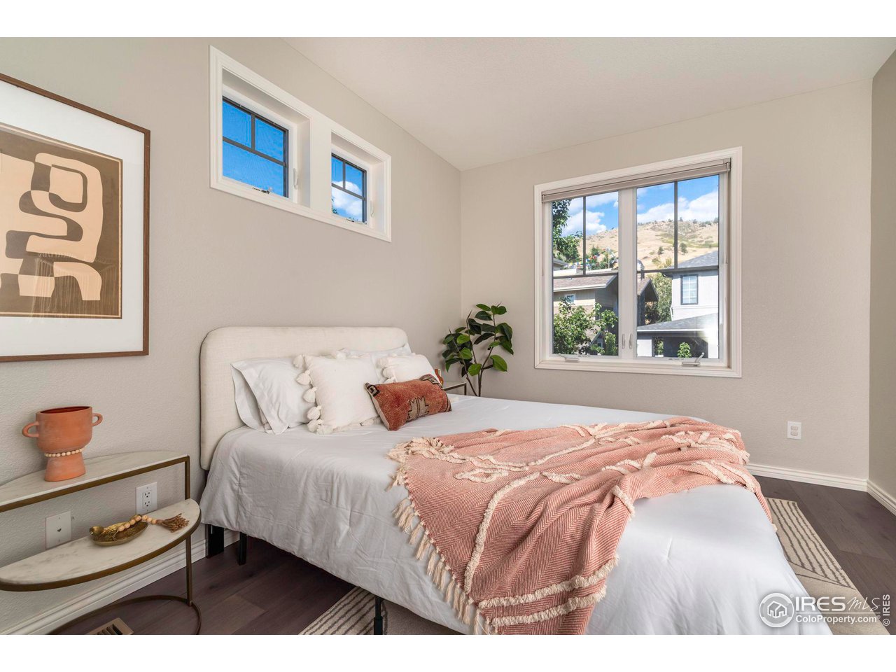 5065 3rd Street Boulder, CO 80304 - Photo 6 of 40 a bedroom with a bed and a window