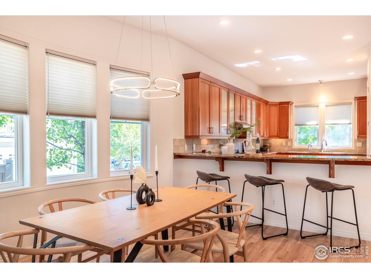 5065 3rd Street Boulder, CO 80304 - Photo 9 of 40 a kitchen with a table chairs and a window