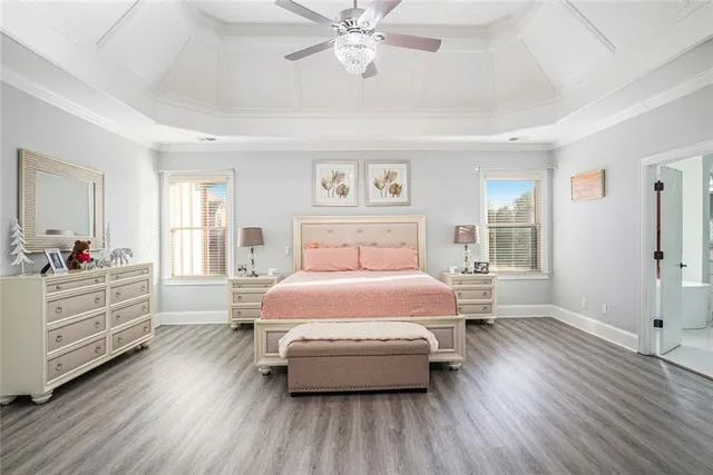 a bathroom with a white bath tub and a shower