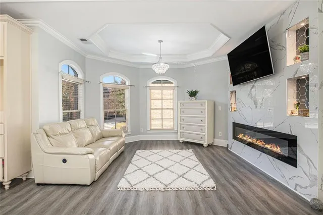 a bedroom with a large bed and a large closet