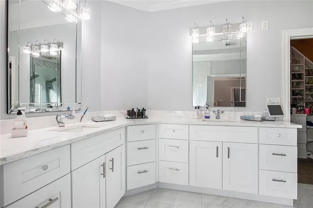 a view of a livingroom with furniture and a large window