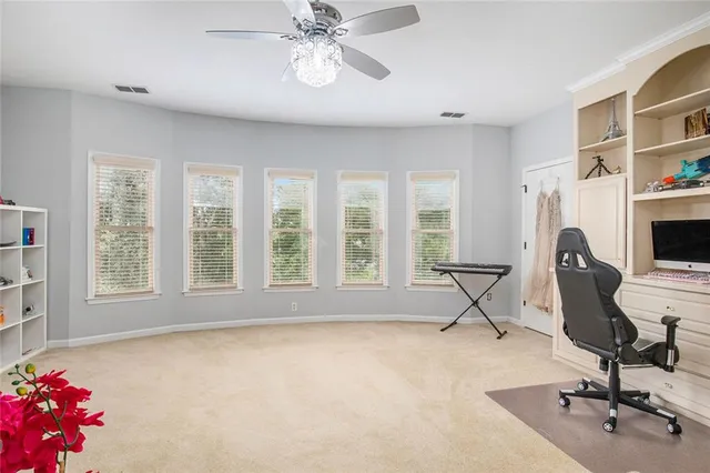 a living room with furniture and a couch