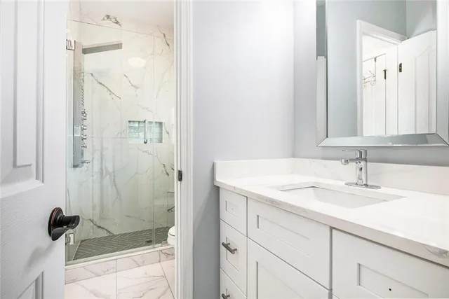 a room with furniture and pool table