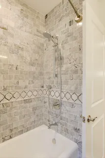 a bathroom with a bathtub