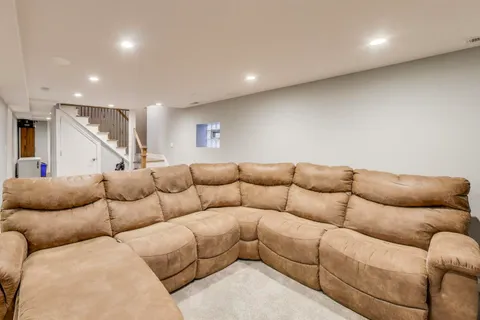 a workspace with furniture and wooden floor