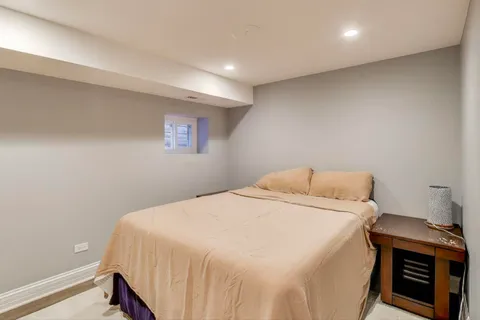 a bathroom with a sink vanity and a mirror