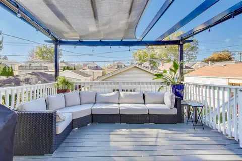 a view of a chair on the roof deck