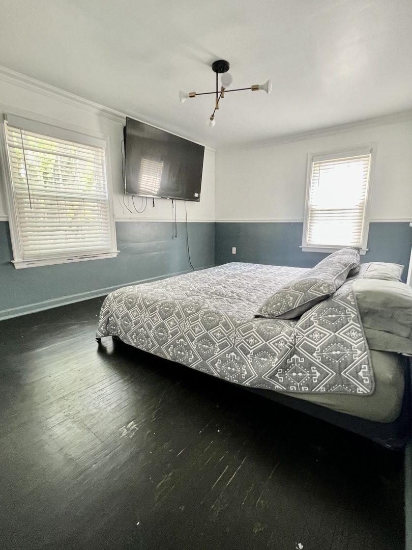 564 Mann Place Elgin, IL 60120 - Photo 14 of 28 a bedroom with a bed and a window