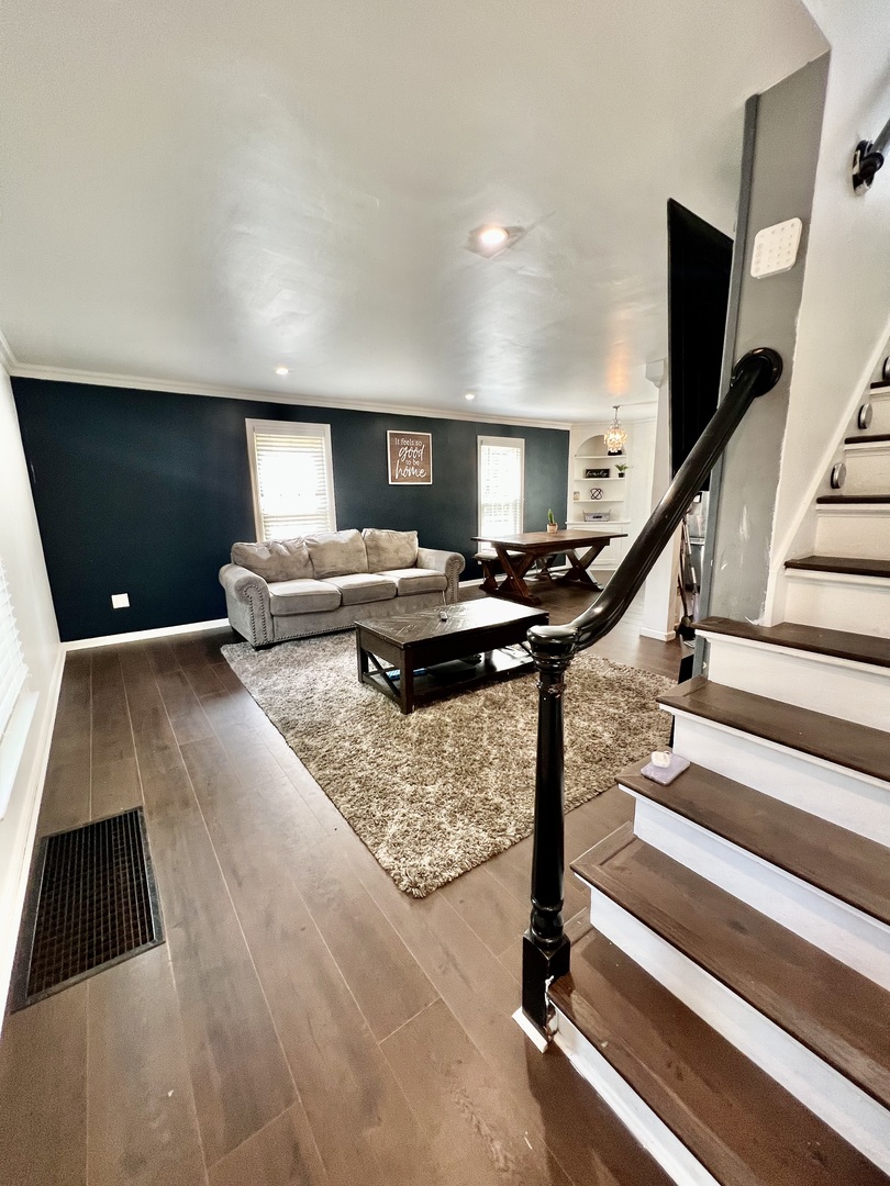 564 Mann Place Elgin, IL 60120 - Photo 4 of 28 a living room with furniture and a flat screen tv