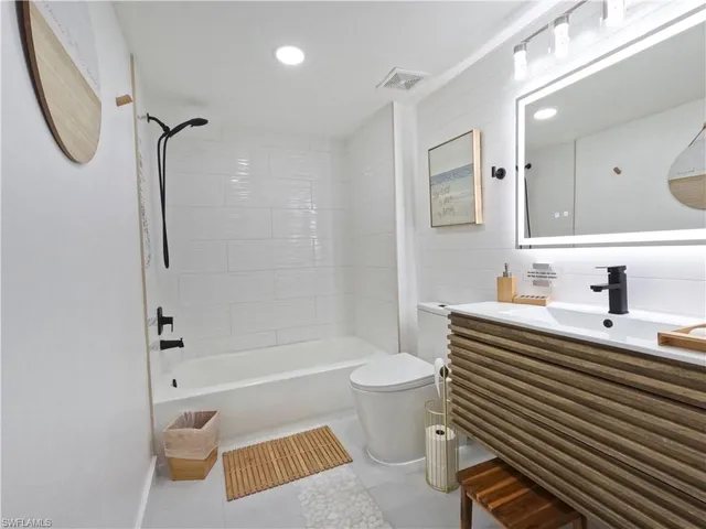 a bed room with a bed and a couch