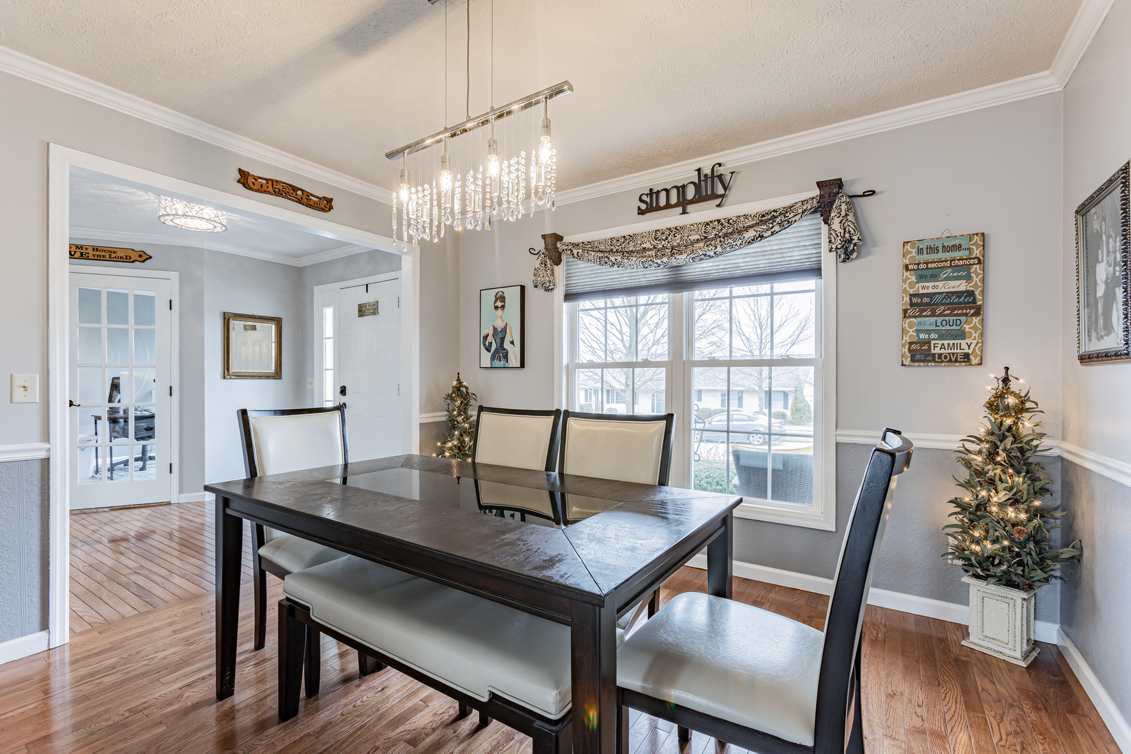 4401 Copper Ridge Road Champaign, IL 61822 - Photo 11 of 49 a view of a dining room with furniture window and wooden floor