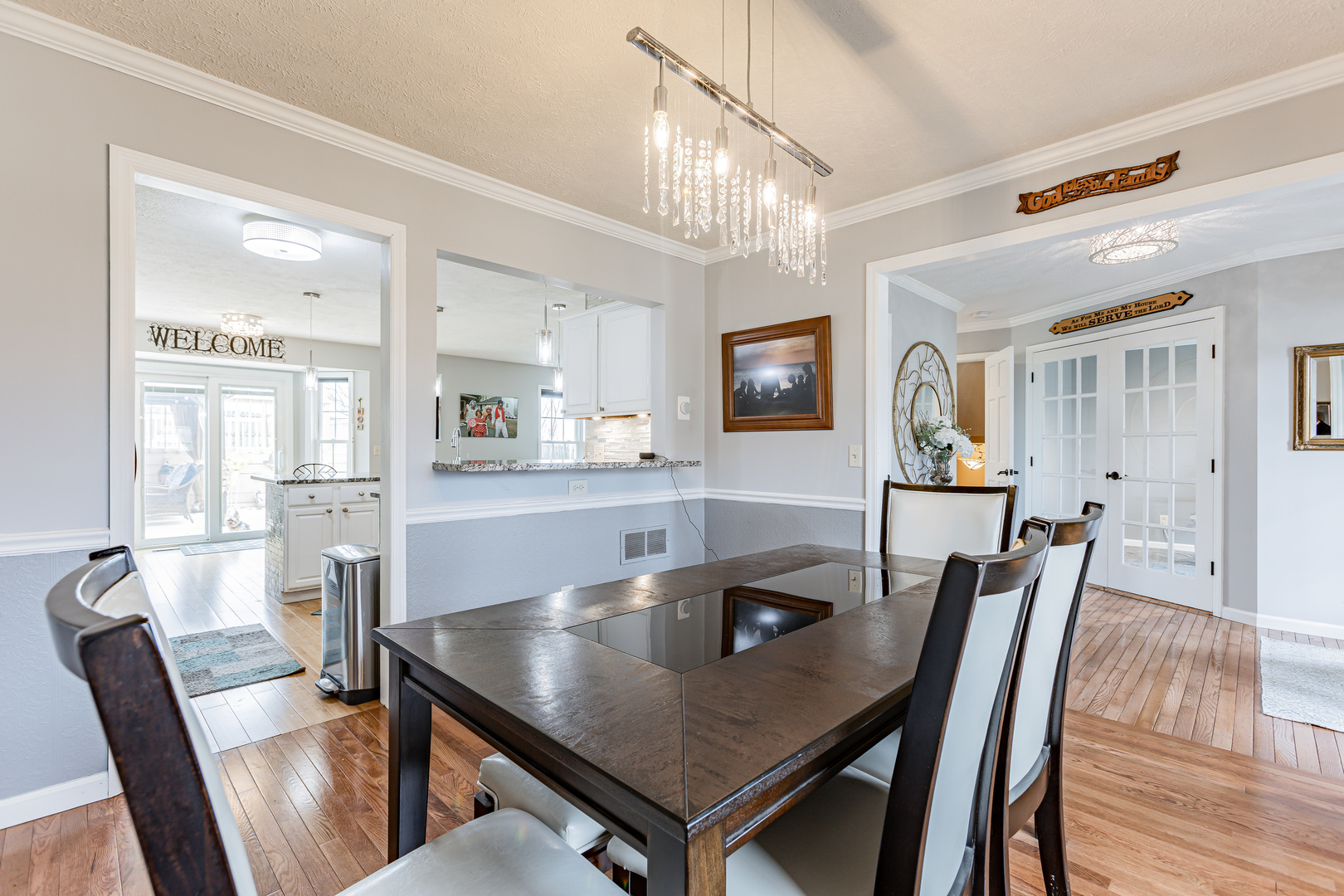 4401 Copper Ridge Road Champaign, IL 61822 - Photo 12 of 49 a view of a dining room with furniture and wooden floor