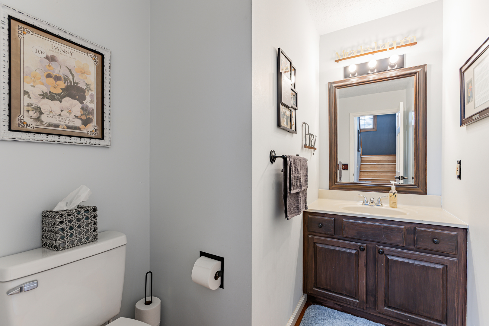 4401 Copper Ridge Road Champaign, IL 61822 - Photo 16 of 49 a bathroom with a sink mirror and toilet