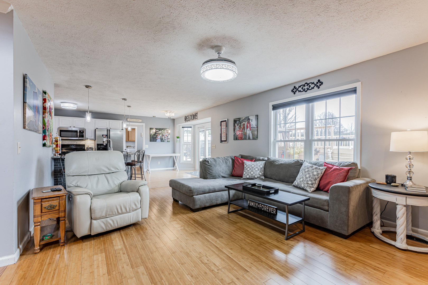 4401 Copper Ridge Road Champaign, IL 61822 - Photo 18 of 49 a living room with furniture and a wooden floor
