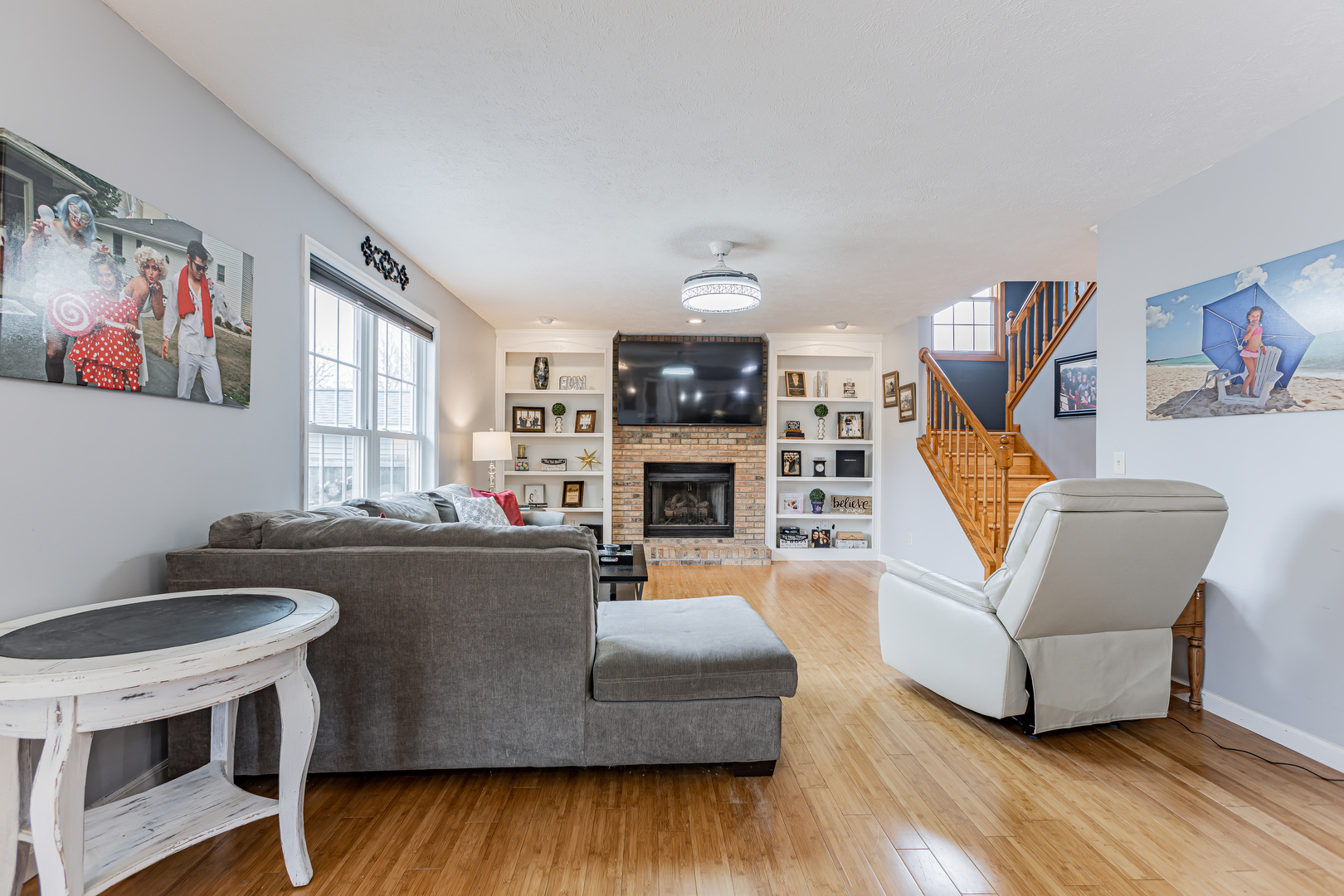 4401 Copper Ridge Road Champaign, IL 61822 - Photo 20 of 49 a living room with furniture and a fireplace