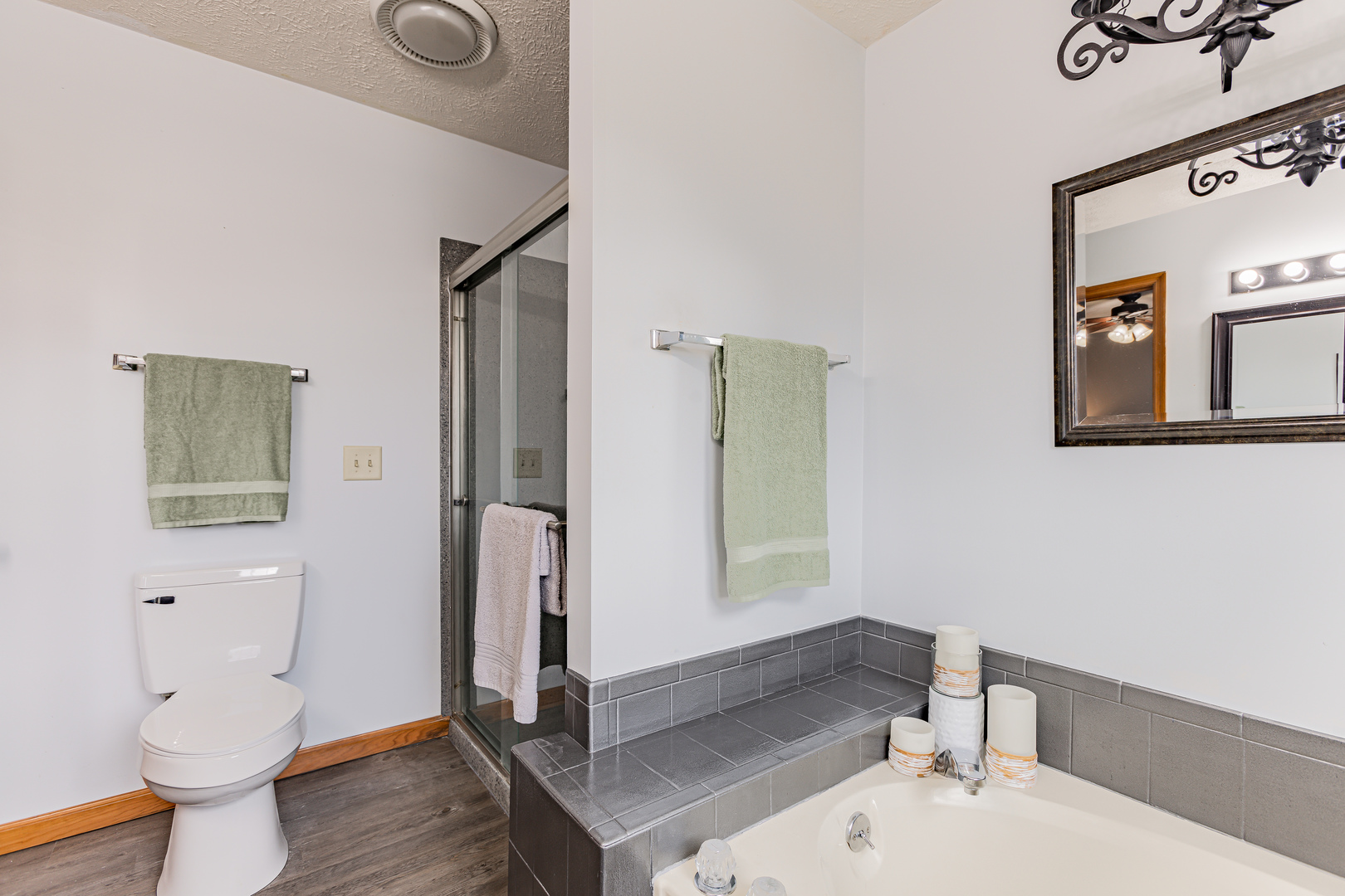 4401 Copper Ridge Road Champaign, IL 61822 - Photo 28 of 49 a bathroom with a toilet a sink and mirror