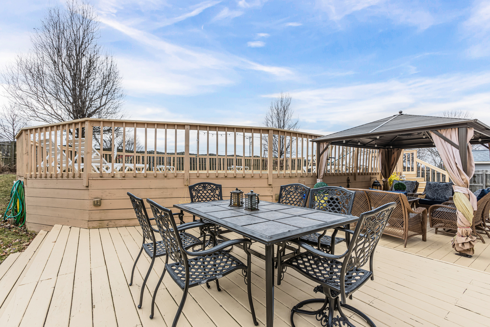4401 Copper Ridge Road Champaign, IL 61822 - Photo 40 of 49 a view of a chairs and table on the terrace