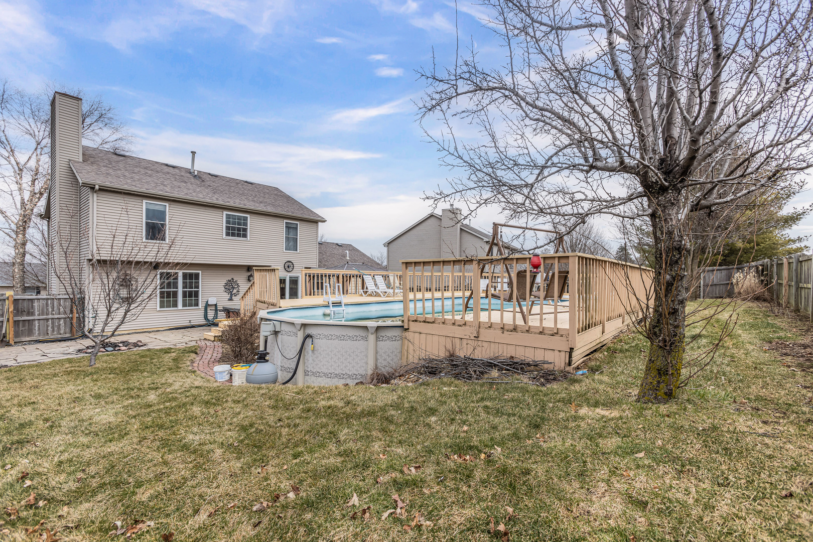 4401 Copper Ridge Road Champaign, IL 61822 - Photo 42 of 49 a view of a house with a yard and sitting area