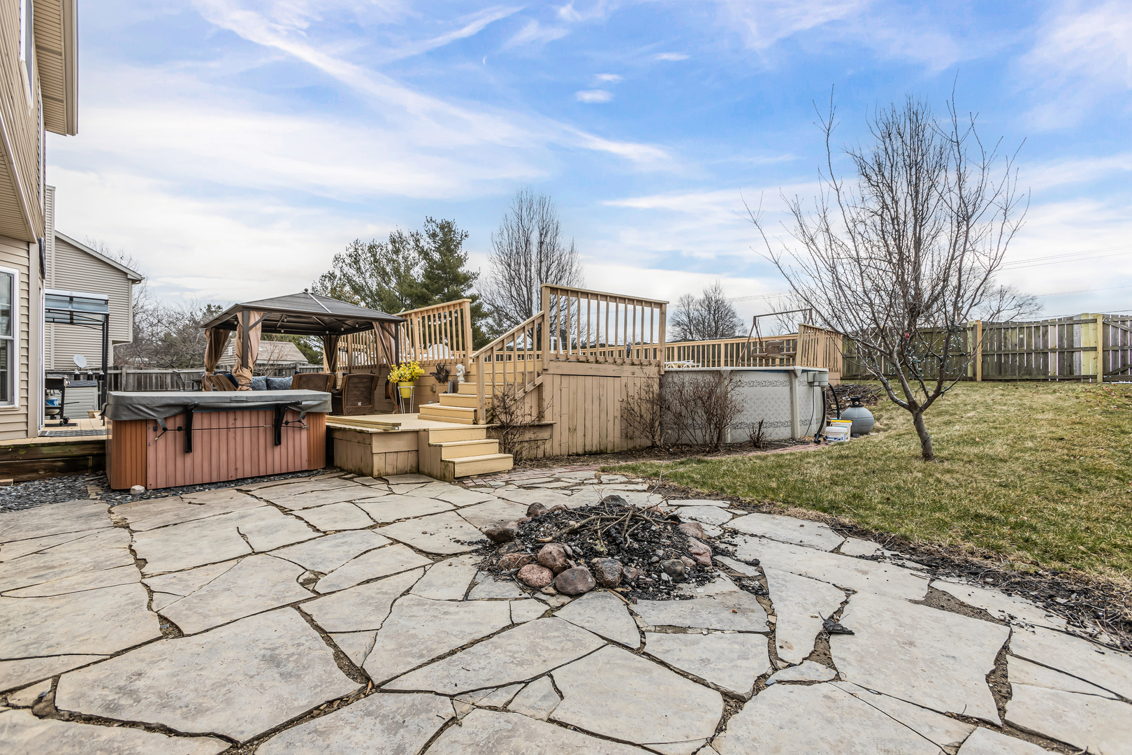 4401 Copper Ridge Road Champaign, IL 61822 - Photo 43 of 49 a view of a yard with table and chairs