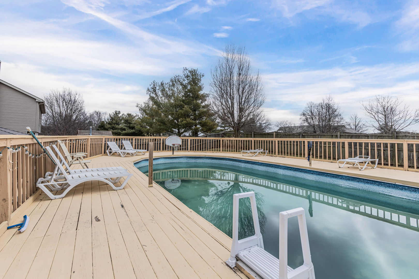 4401 Copper Ridge Road Champaign, IL 61822 - Photo 45 of 49 a view of a roof deck with couches and wooden floor