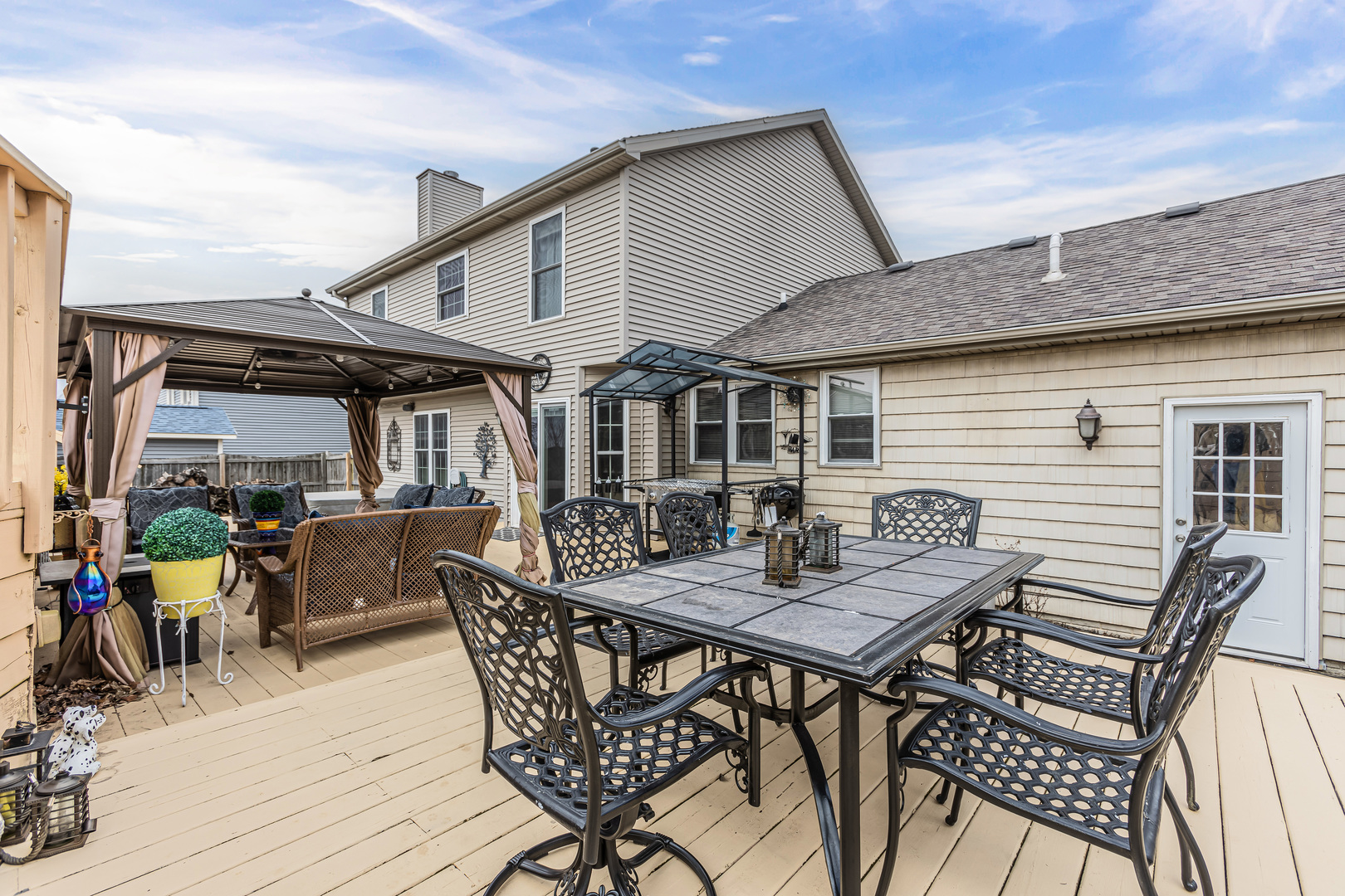 4401 Copper Ridge Road Champaign, IL 61822 - Photo 48 of 49 a view of a house with patio and wooden floor