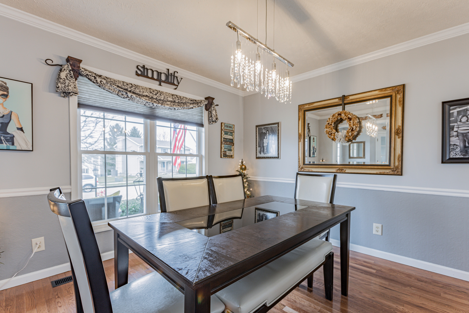 4401 Copper Ridge Road Champaign, IL 61822 - Photo 10 of 49 a view of a dining room with furniture window and wooden floor