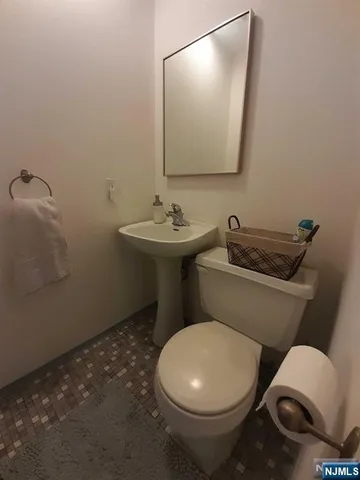 a view of a storage & utility room with washer and dryer