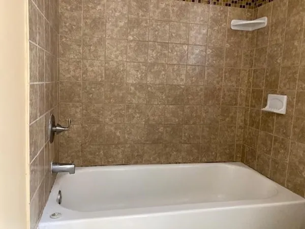 a bathroom with a bathtub