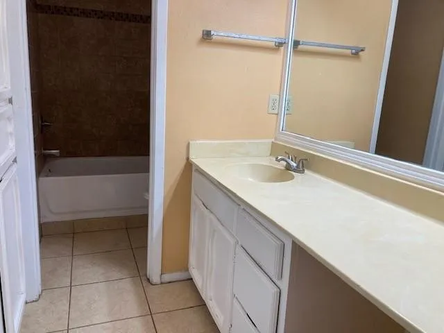 a bathroom with a sink and a bathtub