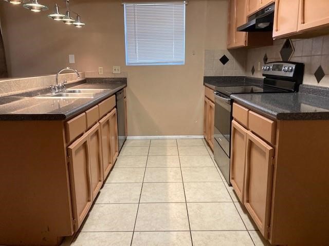 4106 Rippling Creek Drive Corpus Christi, TX 78410 - Photo 9 of 22 a kitchen with a sink stove and cabinets