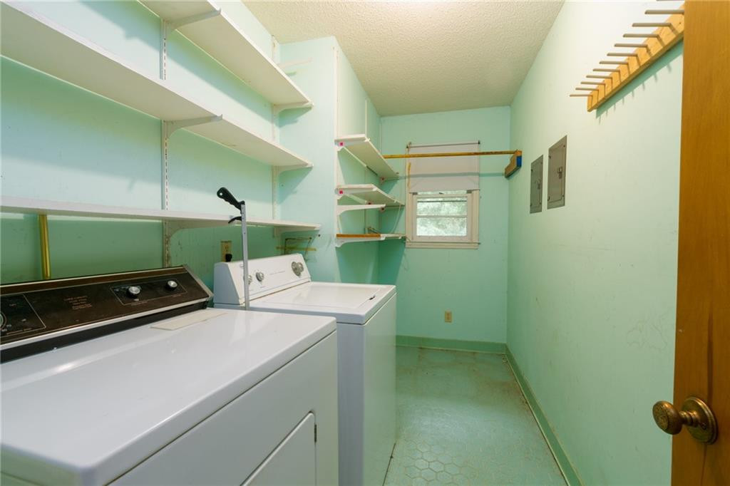 6533 Monnett Road Climax, NC 27233 - Photo 13 of 13 a utility room with dryer and washer