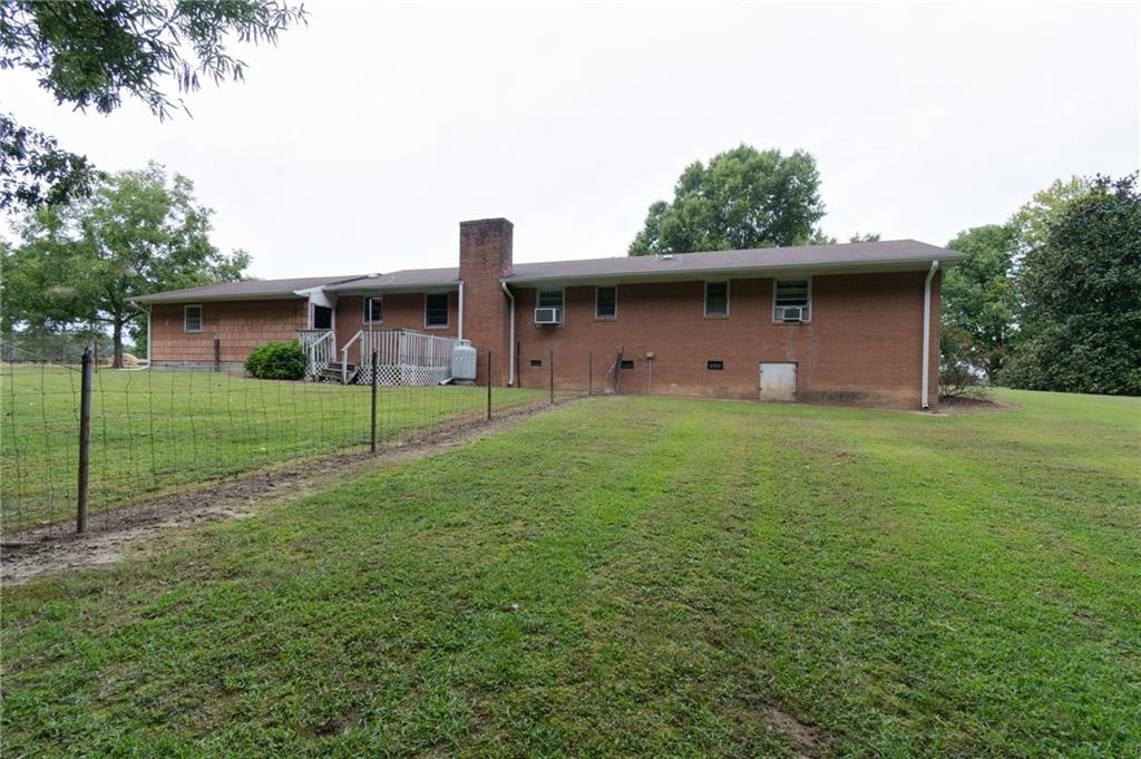 6533 Monnett Road Climax, NC 27233 - Photo 3 of 13 a house view with a garden space