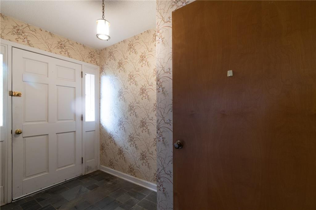 6533 Monnett Road Climax, NC 27233 - Photo 4 of 13 en empty room with closet and wooden floor